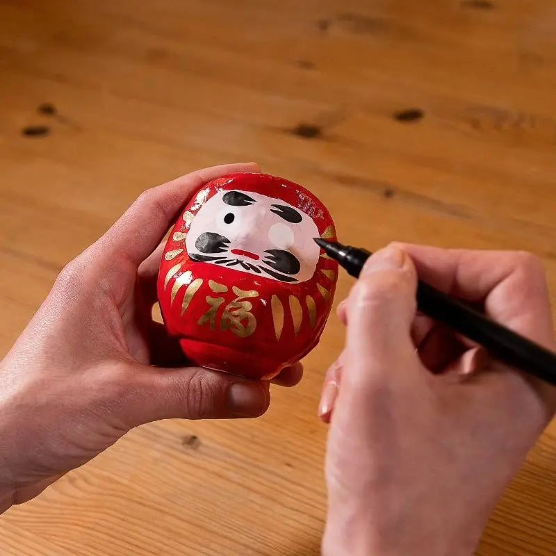 Daruma vermelho mini, figura tradicional japonesa de boa sorte