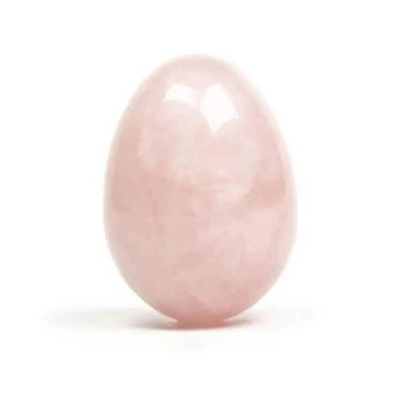 Yoni egg de quartzo rosa em pedra natural polida