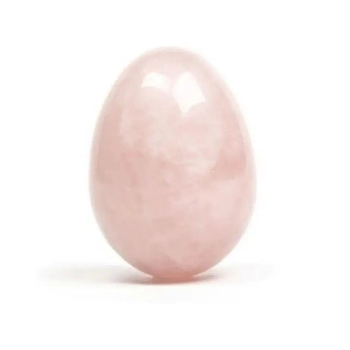 Yoni egg de quartzo rosa em pedra natural polida