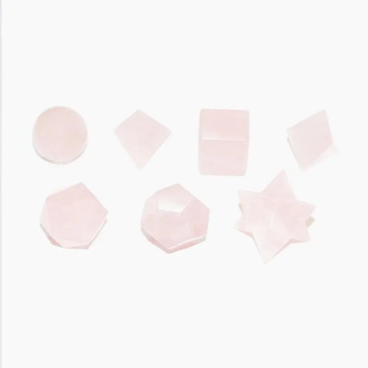 Conjunto de 7 sólidos platónicos de Quartzo Rosa com estojo em madeira
